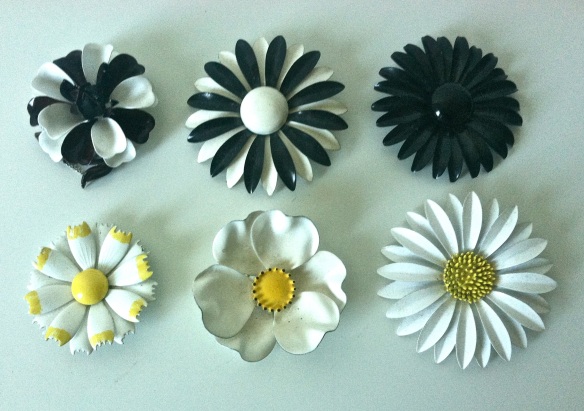 Black and white metal flower pins from the 1960's