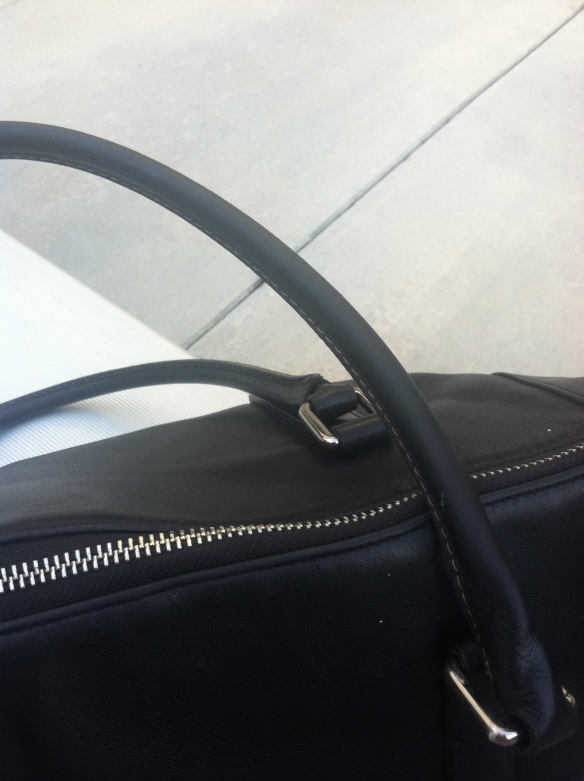 Black coach bag with handle