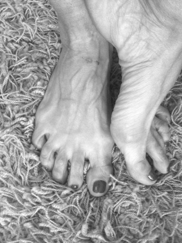 Jill's feet on a shag rug