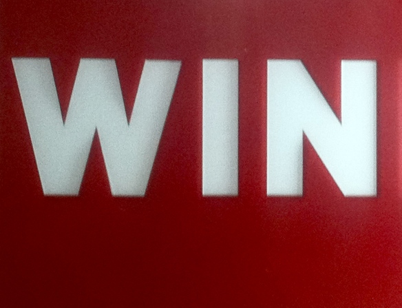 sign that says WIN